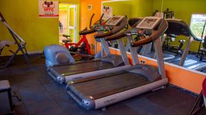 a gym with two tread machines in a room at Eldoret home, Q10 unity homes in Eldoret