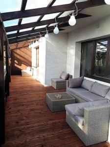 Posezení v ubytování Apartament Roztoki 4a