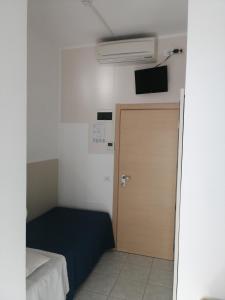TV a/nebo společenská místnost v ubytování B&B - Meuble' - Hotel " CORDIALE "