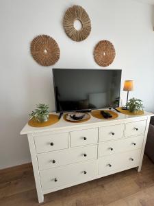 TV a/nebo společenská místnost v ubytování Club218 Holiday Apartman Siófok