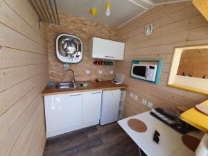 Køkken eller tekøkken på Triplex avec terrasse en rooftop, au coeur de Sete + 11 billeder