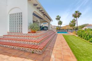 a home with steps leading to a house at Casa Anemone in Denia