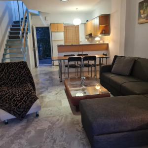 Kuchyň nebo kuchyňský kout v ubytování Megusta Apartments selianitika