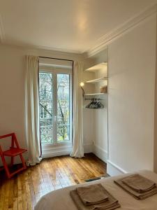 Φωτογραφία από το άλμπουμ του Cosy appartement Montmartre στο Παρίσι