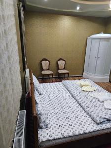 Ein Bett oder Betten in einem Zimmer der Unterkunft NL hotel