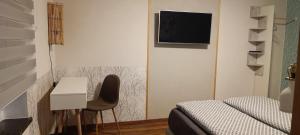 TV a/nebo společenská místnost v ubytování Haus MaRi