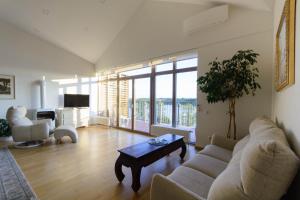 A seating area at The best apartment in Trakai! Retreat! Rejuvenate! Rent with Ease!