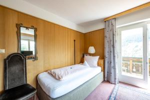 Letto o letti in una camera di Haus Widdersteinblick
