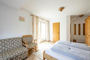 Letto o letti in una camera di Haus Widdersteinblick