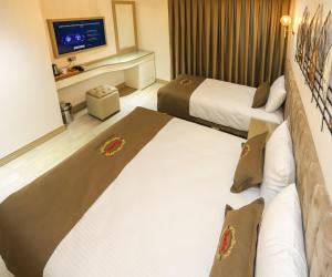 Postel nebo postele na pokoji v ubytování Safa Hotel Old City