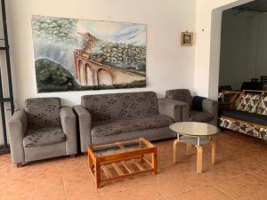Area soggiorno di Kandy Siebel Bungalow