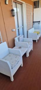 A bed or beds in a room at Casa Stazione Magliana