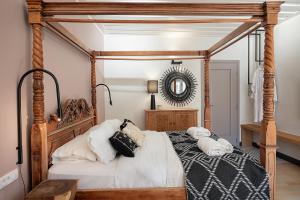 Postel nebo postele na pokoji v ubytování Vranas Ambiance Hotel