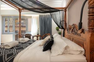 Postel nebo postele na pokoji v ubytování Vranas Ambiance Hotel