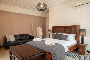 Postel nebo postele na pokoji v ubytování Vranas Ambiance Hotel