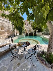 Bazén v ubytování Cappadocia Gamirasu Cave Hotel nebo v jeho okolí