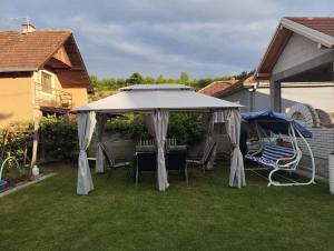 Vrt pred nastanitvijo Apartman 23
