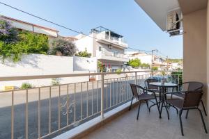 Балкон или терраса в SithoniaRS Cozy Luxury Apartment +35 фотографий
