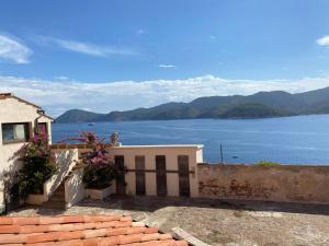 a house with a view of the water at Isola d'Elba - Le Case di Bart in Portoferraio