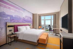 Postel nebo postele na pokoji v ubytování Days Hotel by Wyndham Chengdu Wenjiang + 11 fotografií