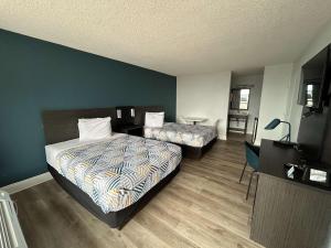 Кровать или кровати в номере Motel 6 Hammond, LA – I 12 – I 55