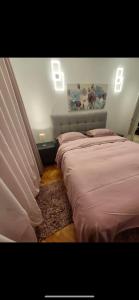 two beds sitting next to each other in a bedroom at Villa Volga in Jelsa