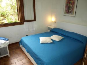 En eller flere senge i et værelse på Stella Marina + 21 billeder