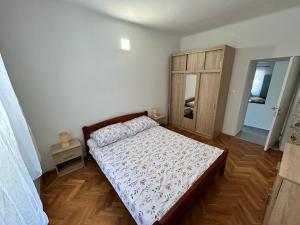 Кровать или кровати в номере Apartments Branko
