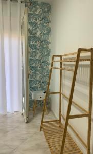 A bed or beds in a room at Casa Ammare