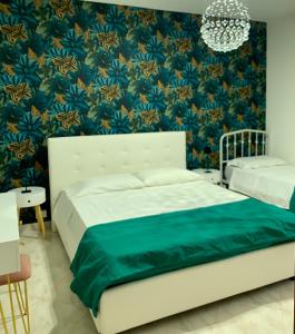 A bed or beds in a room at Casa Ammare