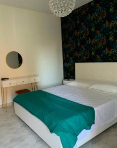 A bed or beds in a room at Casa Ammare