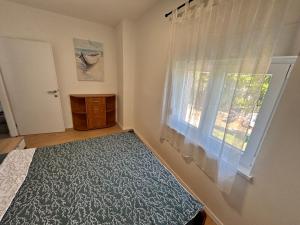 Кровать или кровати в номере Apartments Branko