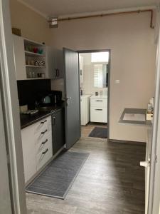 Kuchyň nebo kuchyňský kout v ubytování Apartmán u Hradu