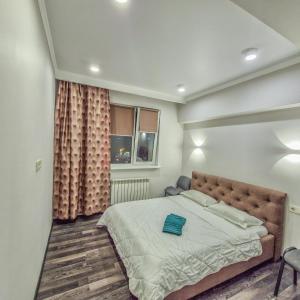 Cama ou camas em um quarto em City Haven Retreat