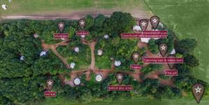 an overhead view of a park with trees at Silver Airstream Glamping & Rental in Chichester
