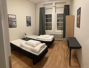 Postel nebo postele na pokoji v ubytování HK Vandrarhem & Longstay