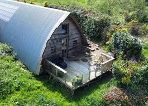 an overhead view of a house with a deck at Creative Art Cabin, Causeway Coast, beach 10 mins in Articlave +27 photos