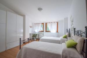 Posteľ alebo postele v izbe v ubytovaní A Casa di Stella
