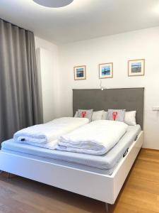 Voodi või voodid majutusasutuse Altstadtliebe Konstanz - zentral & modern toas