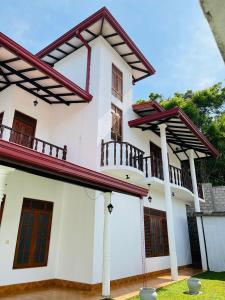 a view of the front of the house at Serendib Villa Mirissa in Mirissa