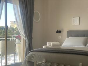 Letto o letti in una camera di Casa Karina