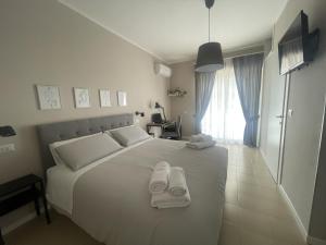 Letto o letti in una camera di Casa Karina