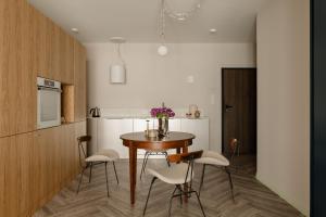 Kuchyňa alebo kuchynka v ubytovaní Sage Apartment