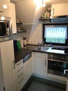 Kuchyň nebo kuchyňský kout v ubytování Ferienhaus Blick up de Kohjen