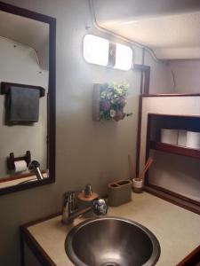 a bathroom with a sink and a mirror at Velero Valencia Whimsy in Valencia
