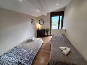 Letto o letti in una camera di Luxury suite with sea and Olympus view