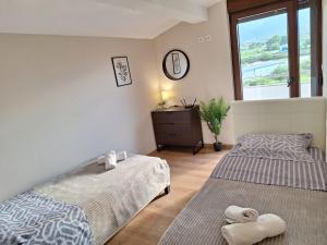 Letto o letti in una camera di Luxury suite with sea and Olympus view