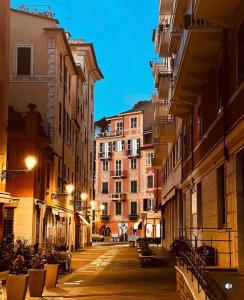 an empty street in a city at night at Sunnyhouse in Santa Margherita Ligure