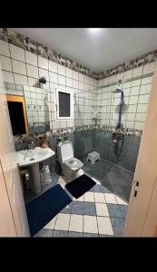 Een badkamer bij villa de Hamza