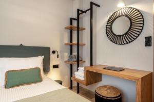 Ένα ή περισσότερα κρεβάτια σε δωμάτιο στο Soleado Studio